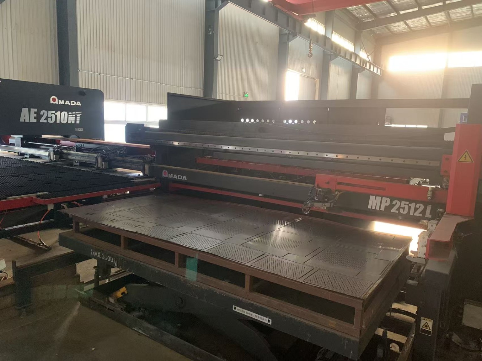 AMADA AE2510NT CNC turret punch and MP2512L automatic sheet loader in Qingdao plant