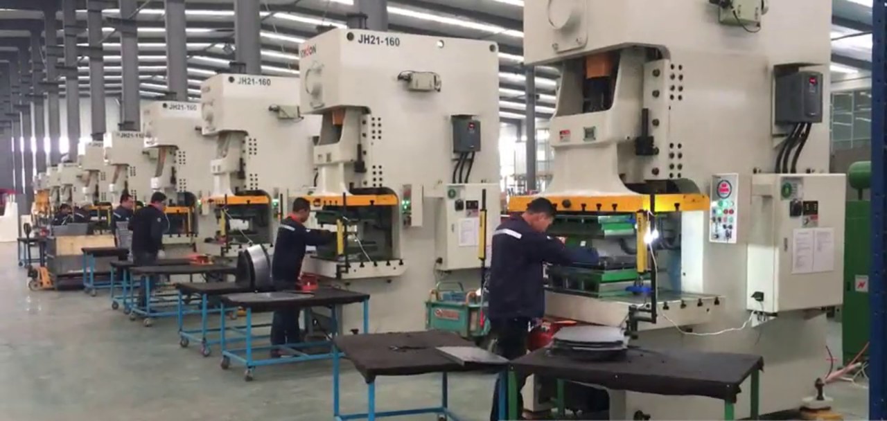 Row of JH21-160 mechanical presses with operators